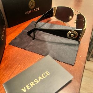 Black and gold Versace sunglasses